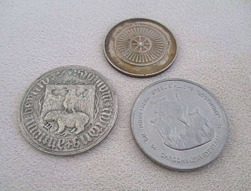 A batch of 15 medallions and tokens