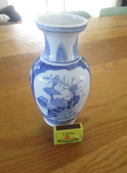 Nice sized blue and white Chinese vase with bird and blossom design
