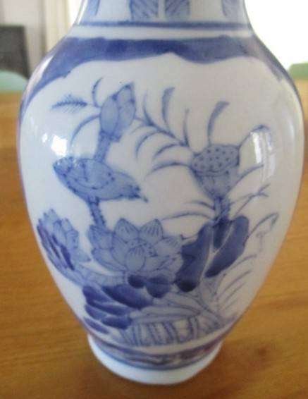 Nice sized blue and white Chinese vase with bird and blossom design