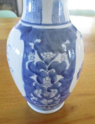 Nice sized blue and white Chinese vase with bird and blossom design