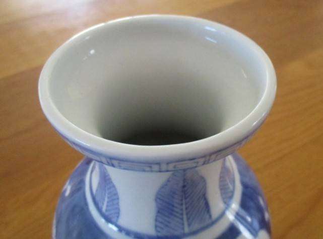 Nice sized blue and white Chinese vase with bird and blossom design