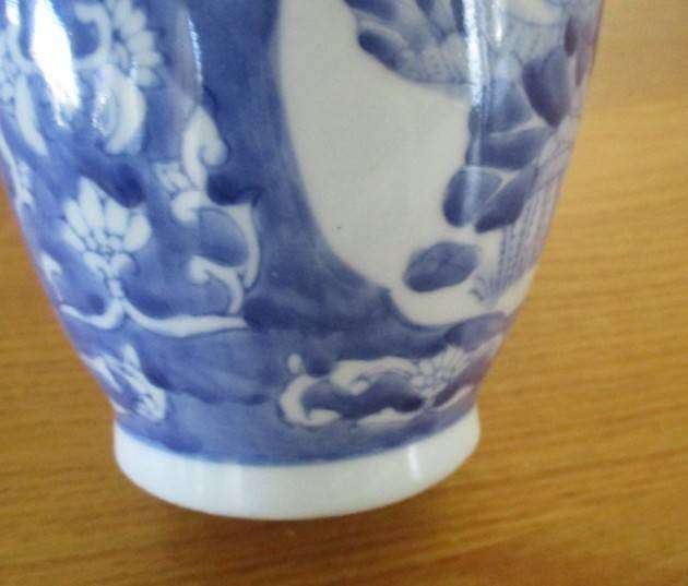 Nice sized blue and white Chinese vase with bird and blossom design