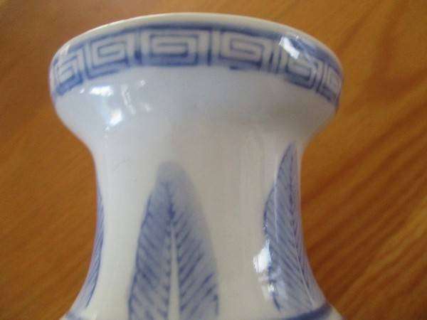 Nice sized blue and white Chinese vase with bird and blossom design