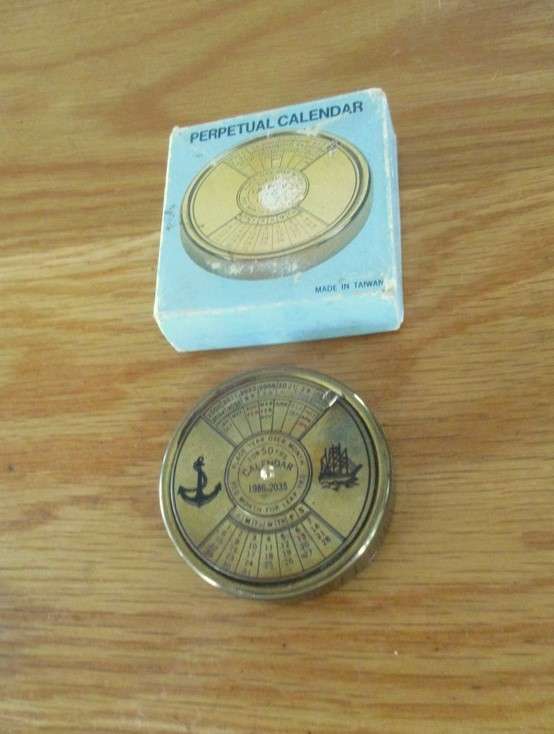 Fun collectable!  Vintage 1980's solid brass 50-year perpetual calendar in original box