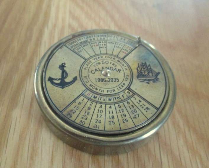 Fun collectable!  Vintage 1980's solid brass 50-year perpetual calendar in original box