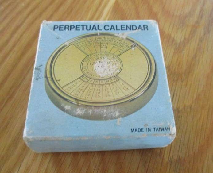 Fun collectable!  Vintage 1980's solid brass 50-year perpetual calendar in original box