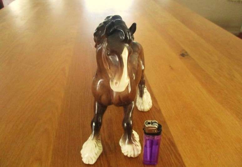 A large vintage porcelain cart horse