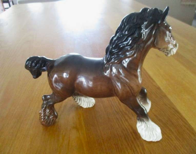 A large vintage porcelain cart horse