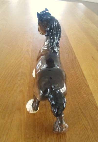 A large vintage porcelain cart horse