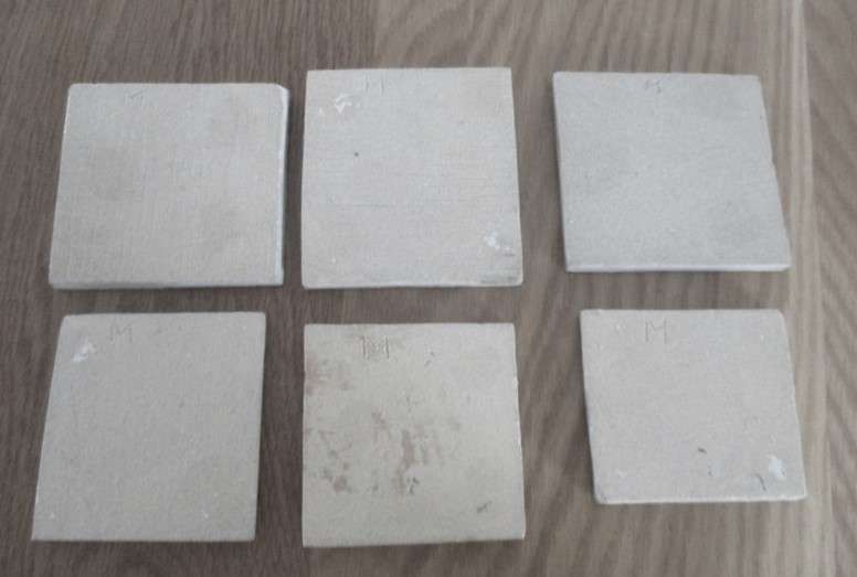 Six quirky, child like hand made miniature tiles - such a happy lot!
