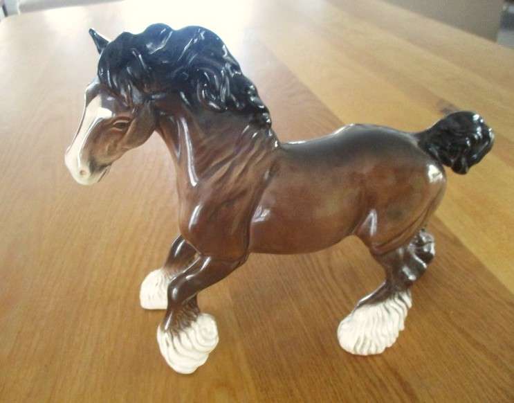 A large vintage porcelain cart horse