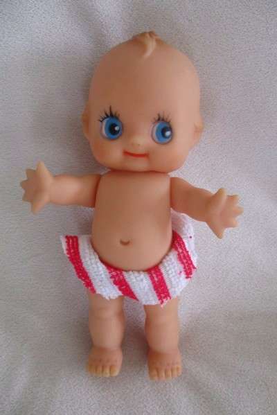 Three adorable small kewpie dolls -Triplets!