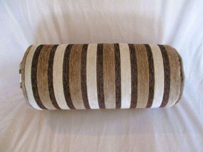 A very well made long, round cushion