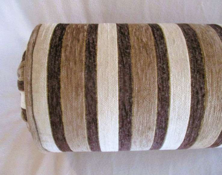 A very well made long, round cushion