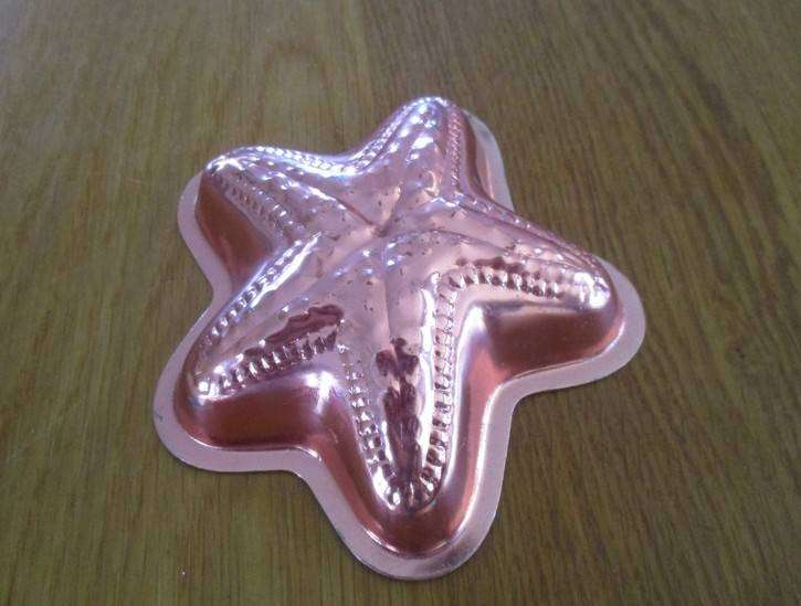 Three small copper jelly moulds