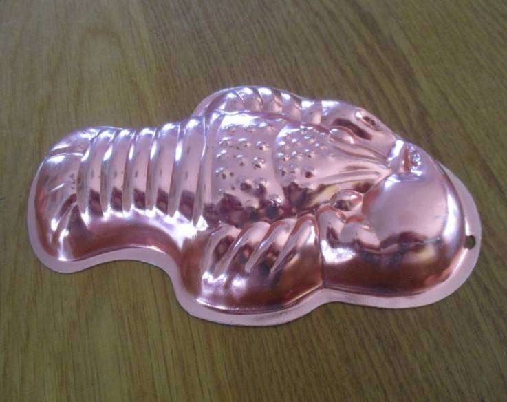 Three small copper jelly moulds