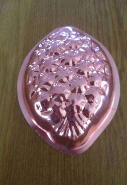 Three small copper jelly moulds