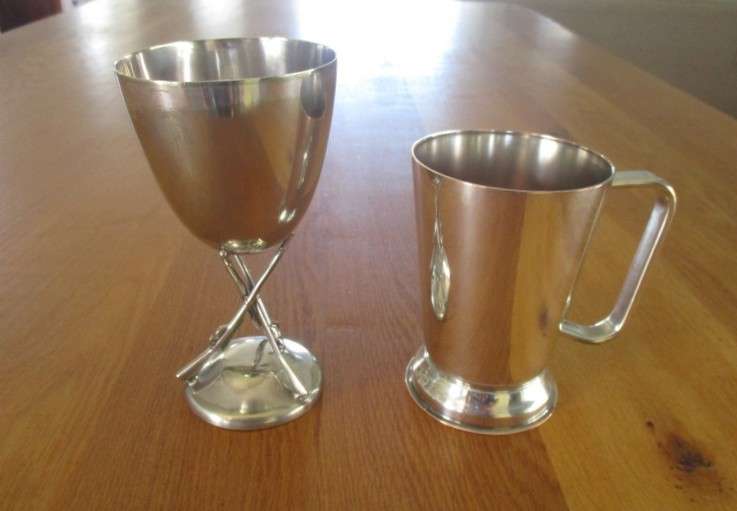 Unusual antique JC & CO silver plated goblet with crossed rifles plus vintage silver plated tankard