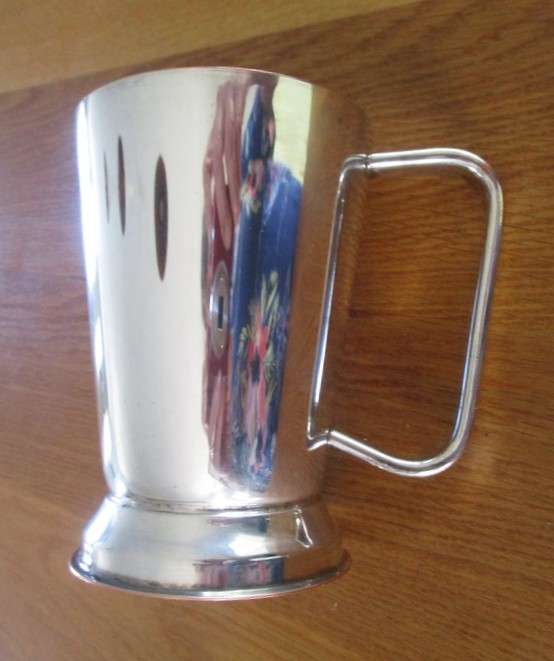 Unusual antique JC & CO silver plated goblet with crossed rifles plus vintage silver plated tankard