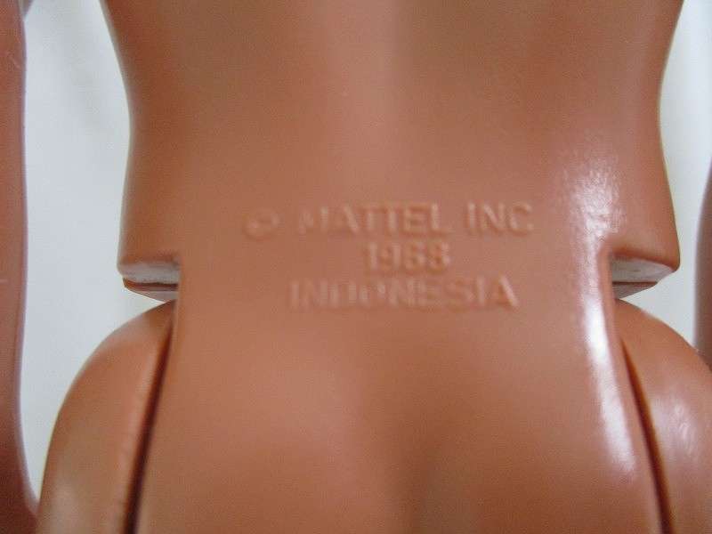 Barbie's boyfriend -  Mattel Ken doll with light brown hair - ready for the beach!