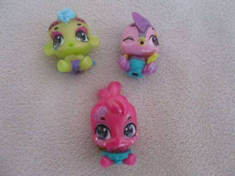 A plastic egg carton containing twelve Hatchimals CollEGGtibles