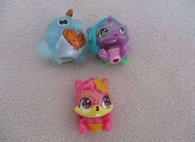 A plastic egg carton containing twelve Hatchimals CollEGGtibles