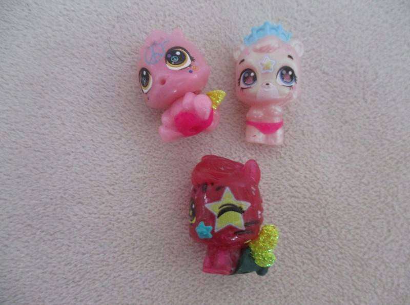 A plastic egg carton containing twelve Hatchimals CollEGGtibles