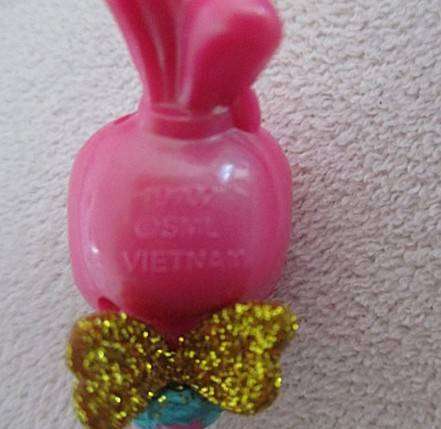 A plastic egg carton containing twelve Hatchimals CollEGGtibles