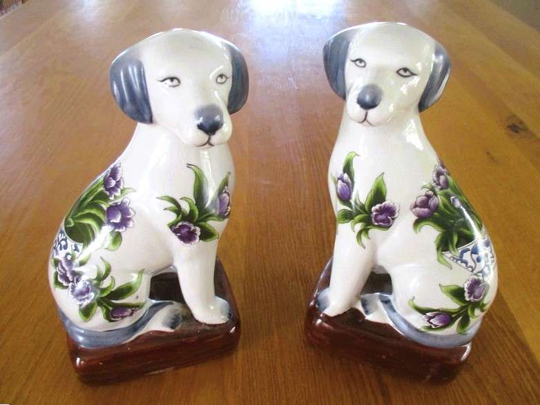Two  hand painted porcelain dogs with decorative floral design - great bookends!