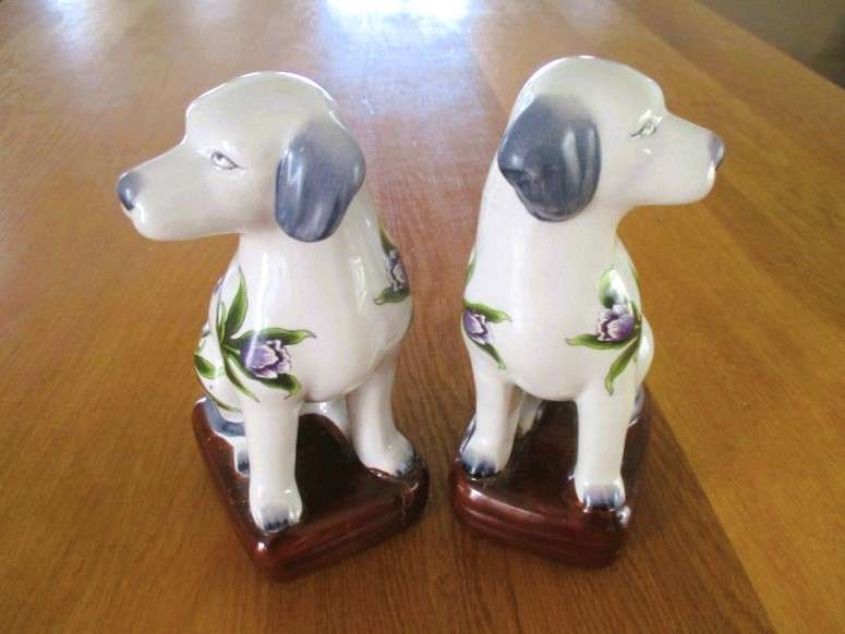 Two  hand painted porcelain dogs with decorative floral design - great bookends!