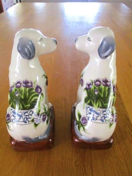 Two  hand painted porcelain dogs with decorative floral design - great bookends!