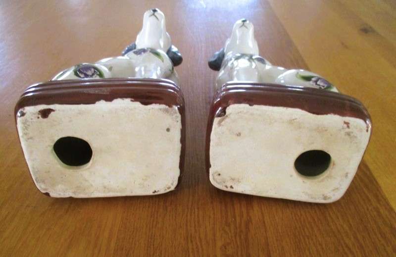 Two  hand painted porcelain dogs with decorative floral design - great bookends!