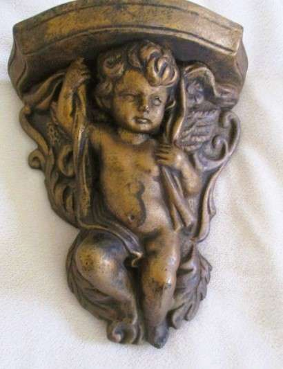 Two small vintage Cherub shelves to display special treasures