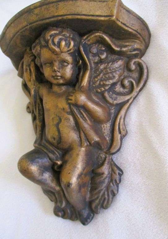 Two small vintage Cherub shelves to display special treasures