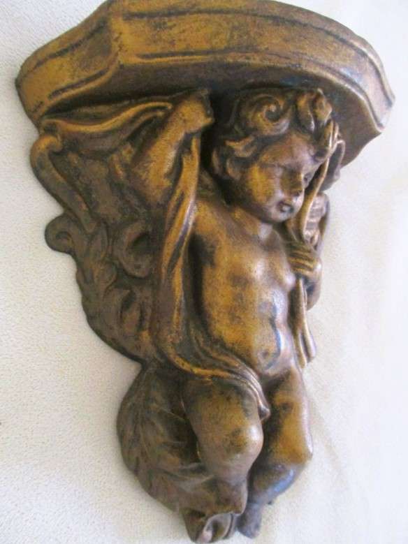 Two small vintage Cherub shelves to display special treasures