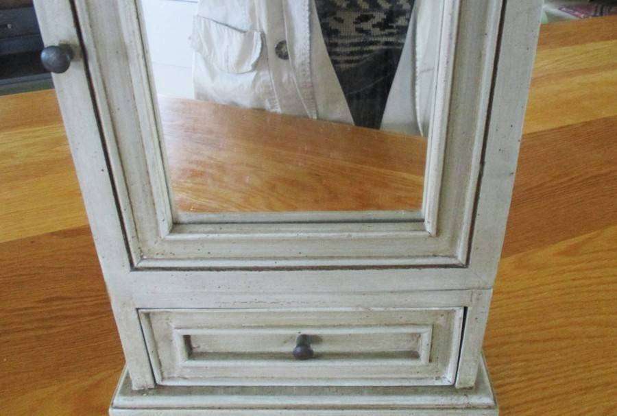 Rustic wooden wall mounted wall cabinet with mirror and bottom drawer and decorative arched pediment