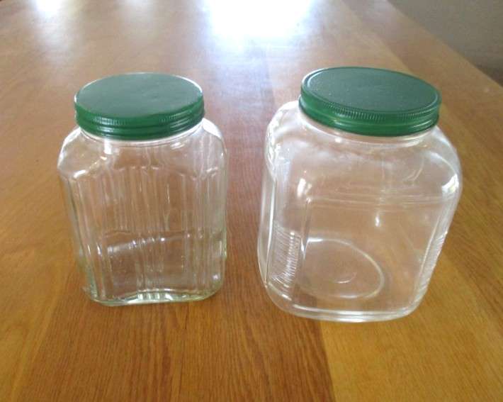 Two large old pickle/chutney jars with metal lids- handy in the kitchen pantry!