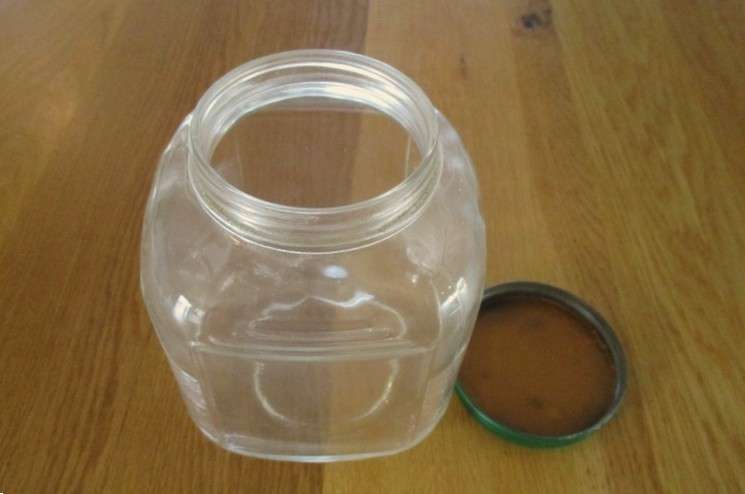 Two large old pickle/chutney jars with metal lids- handy in the kitchen pantry!