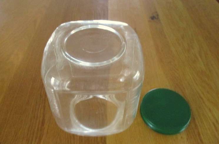 Two large old pickle/chutney jars with metal lids- handy in the kitchen pantry!