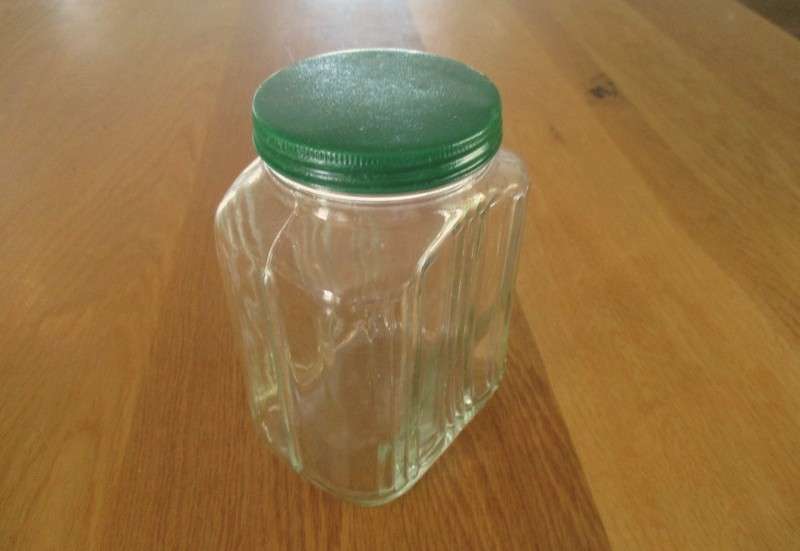 Two large old pickle/chutney jars with metal lids- handy in the kitchen pantry!