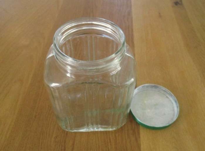Two large old pickle/chutney jars with metal lids- handy in the kitchen pantry!
