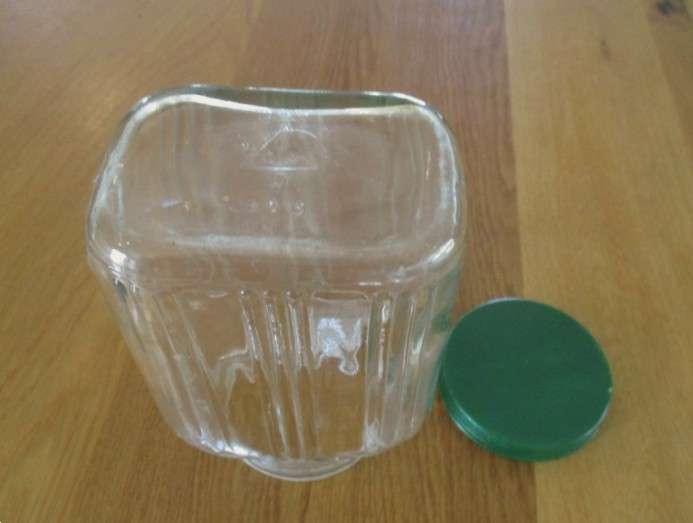 Two large old pickle/chutney jars with metal lids- handy in the kitchen pantry!