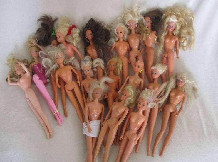 For the Barbie remodeller/custom builder -a whole box of incomplete Barbies and spare parts