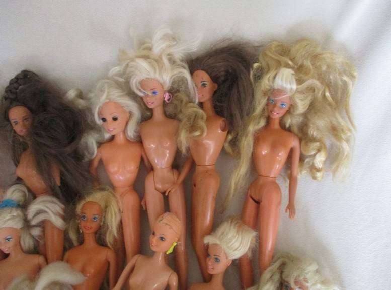 For the Barbie remodeller/custom builder -a whole box of incomplete Barbies and spare parts