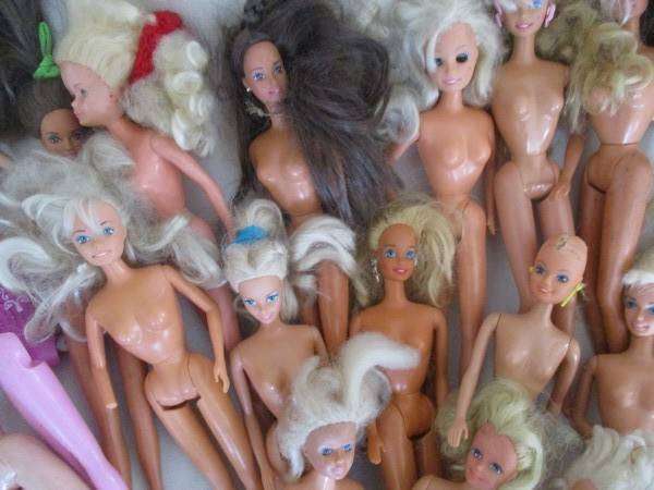 For the Barbie remodeller/custom builder -a whole box of incomplete Barbies and spare parts