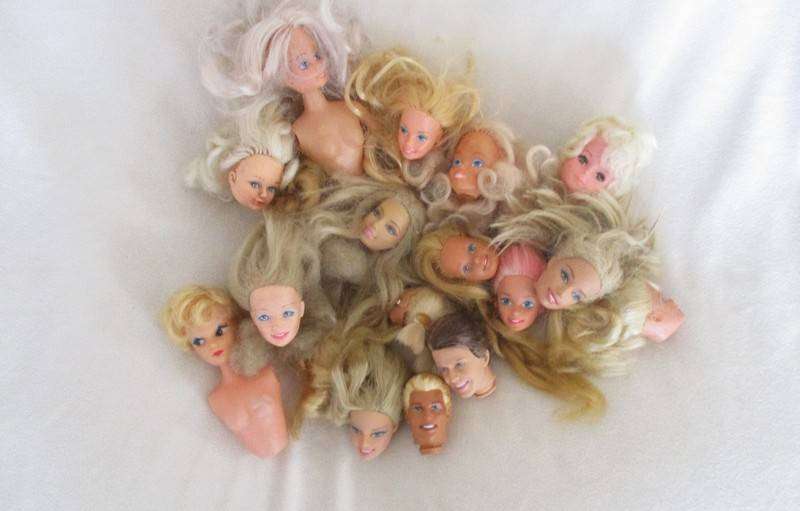 For the Barbie remodeller/custom builder -a whole box of incomplete Barbies and spare parts