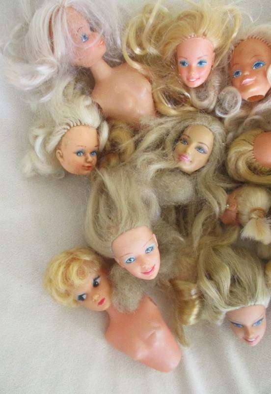 For the Barbie remodeller/custom builder -a whole box of incomplete Barbies and spare parts