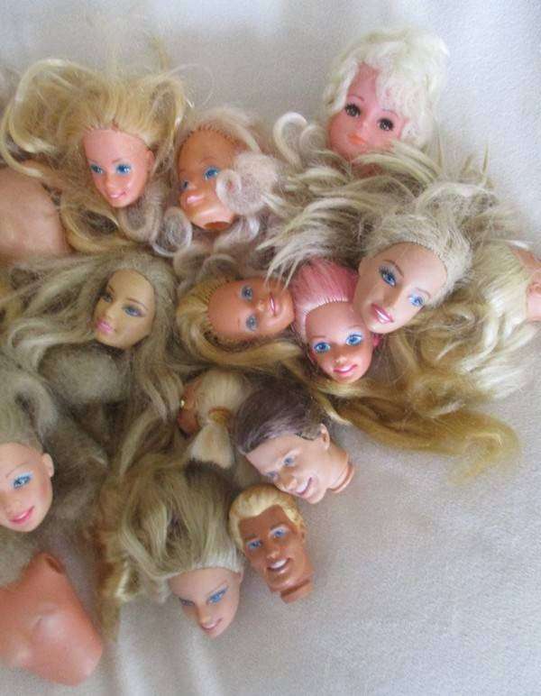 For the Barbie remodeller/custom builder -a whole box of incomplete Barbies and spare parts