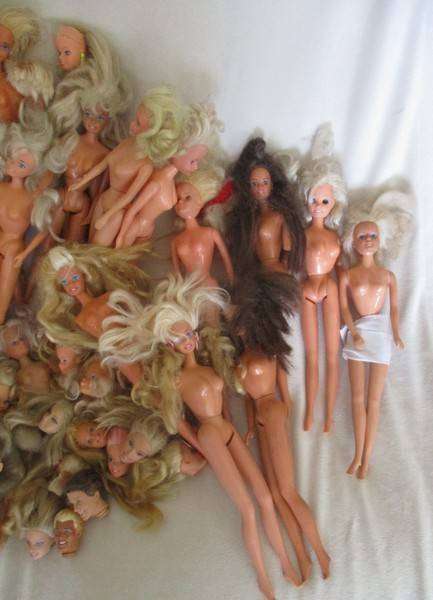 For the Barbie remodeller/custom builder -a whole box of incomplete Barbies and spare parts