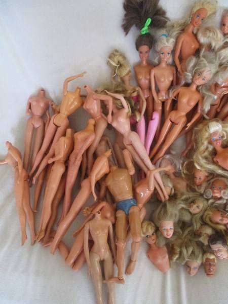 For the Barbie remodeller/custom builder -a whole box of incomplete Barbies and spare parts